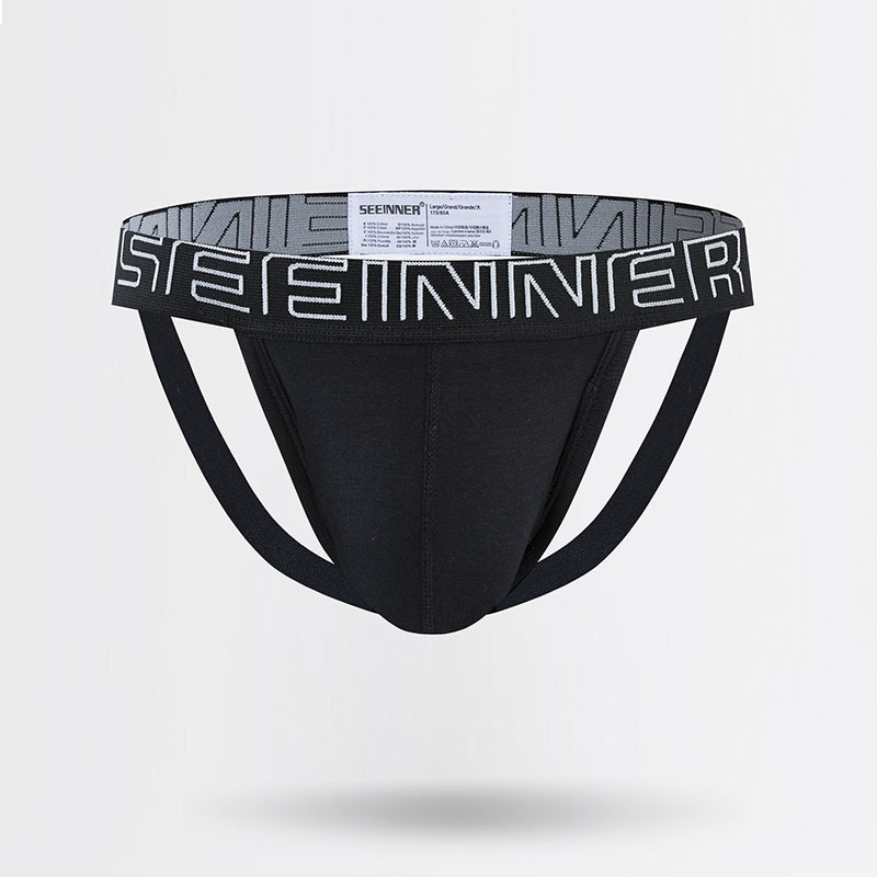 Ropa interior sexy de algodón para hombre, tanga de cintura baja de color liso, doble, para comercio exterior.