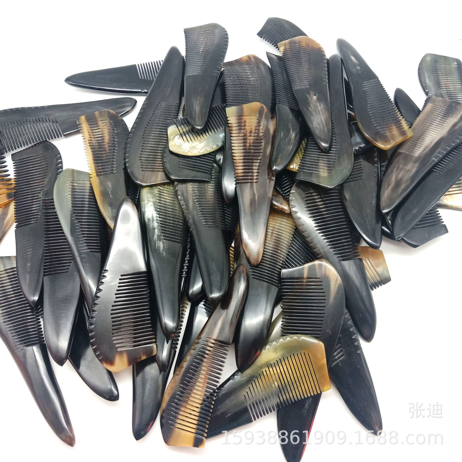 随形翘尾天然带柄牛角梳子精品美发梳子百货头梳黑牛角厂家直销