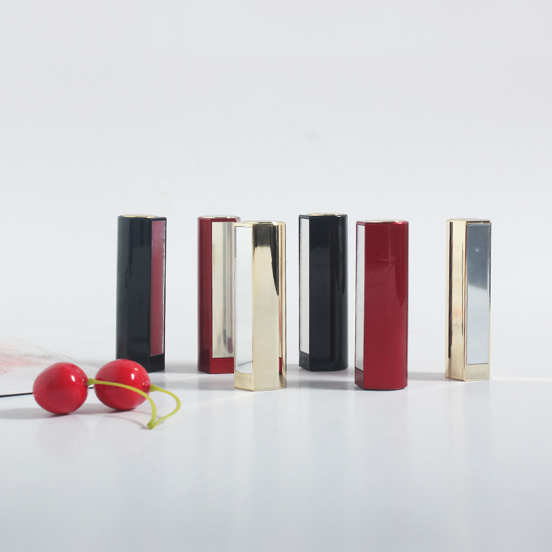 En stock tubo de lápiz labial al por mayor con espejo suministro de plástico 12,1 calibre primavera oro negro rojo paquete de maquillaje lápiz labial tubo vacío