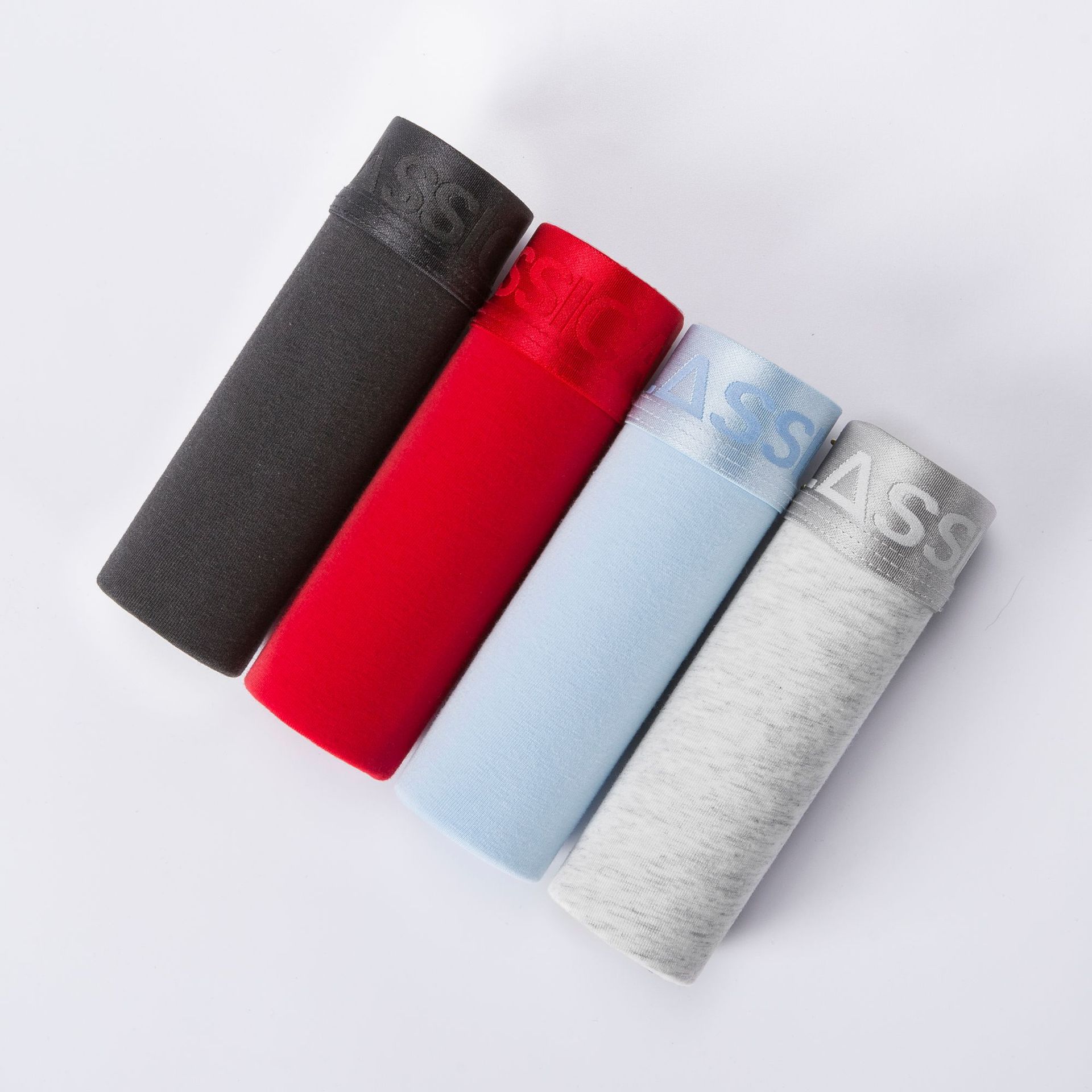 Fabricantes de ropa interior para hombres populares de color sólido ropa interior de algodón boxers en caja pantalones cortos calzoncillos de cabeza boxeadores al por mayor transfronterizos