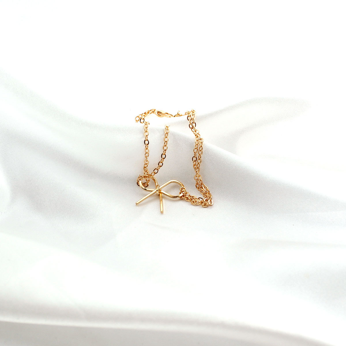 Alloy Pendant Material Classic Style Bow Knot Alloy Cable Chain Chain & Link Bracelets Wholesale
