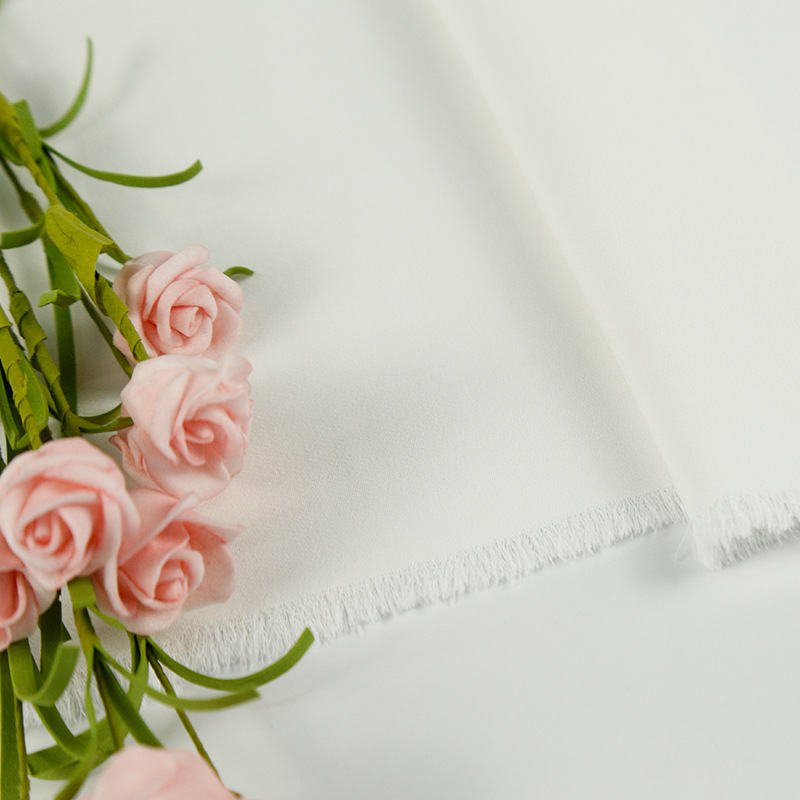 厂家直销 斜纹100%人丝弹力布  素色弹力连衣裙服装面料