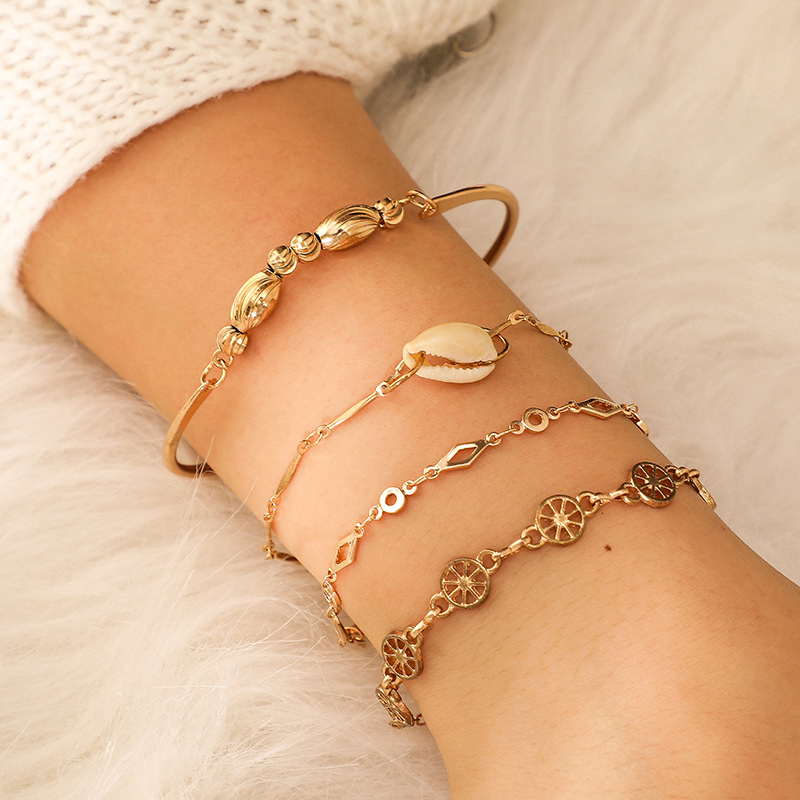 Fashion Gold Bead Round Hollow Shell Bracelet 4 Piece Set Combination Female display picture 12