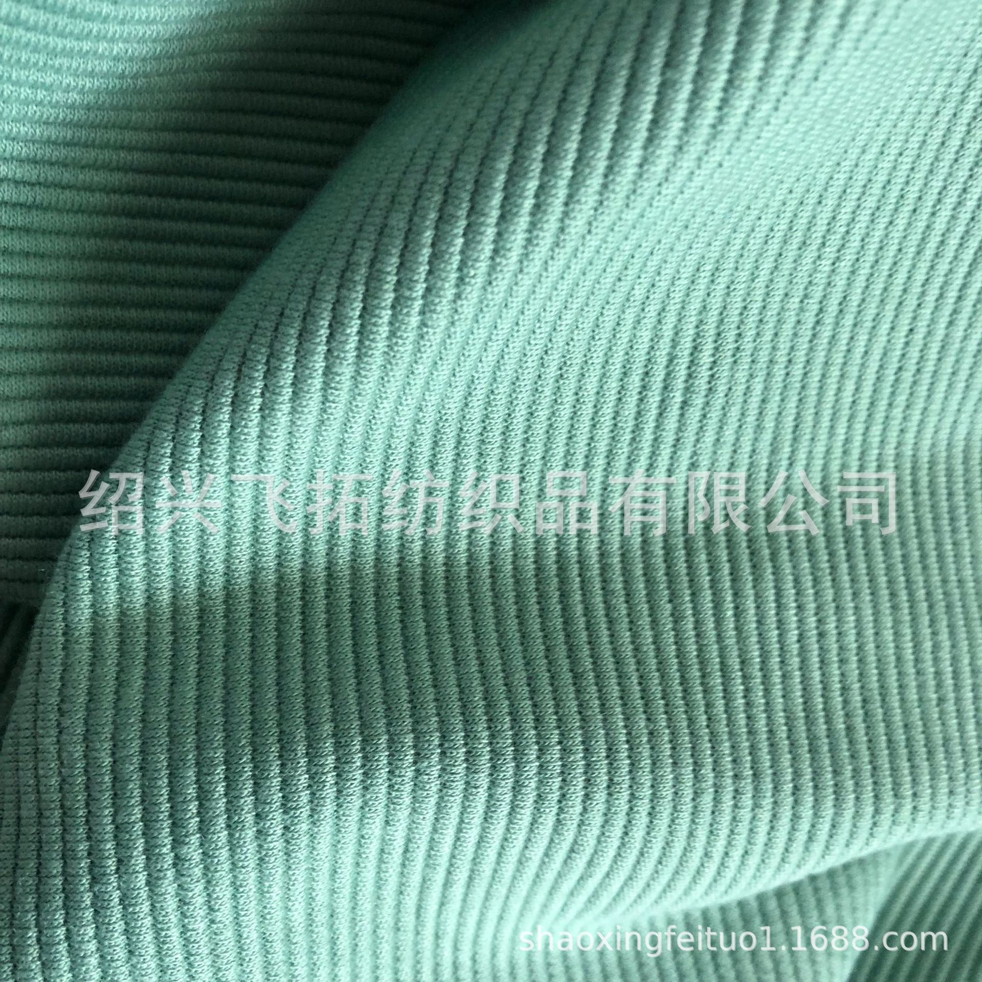 厂家直销针织TR氨纶坑条楼梯布面料 高档服装楼梯布