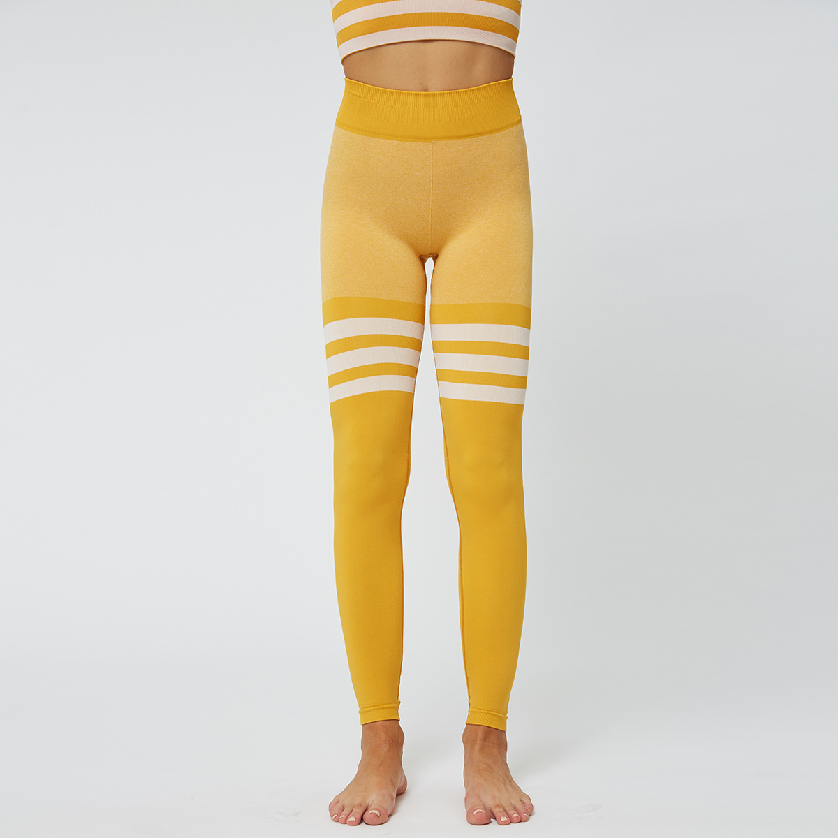 Pantalones deportivos de secado rápido transpirables a rayas sin costuras NSNS12225