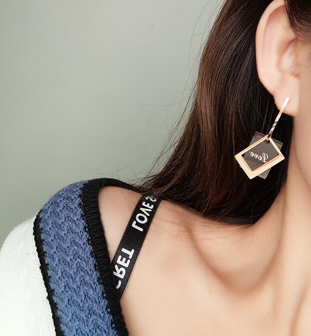 Fashion Hollow Black Long Square Titanium Steel Earrings Wholesale Nihaojewelry display picture 1