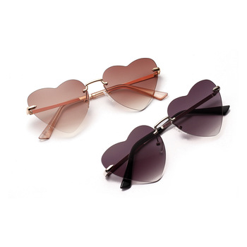 New Fashion Frameless Round Retro Glasses Transparent Color Lens Sunglasses display picture 1