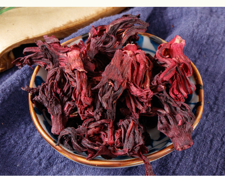 Roselle Hibiscus Flowers (Hibiscus sabdariffa) — Dried Luoshenhua Calyx Tea, 70g Jar in use