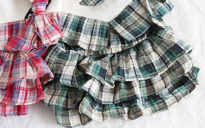 彩格口袋拼接裙