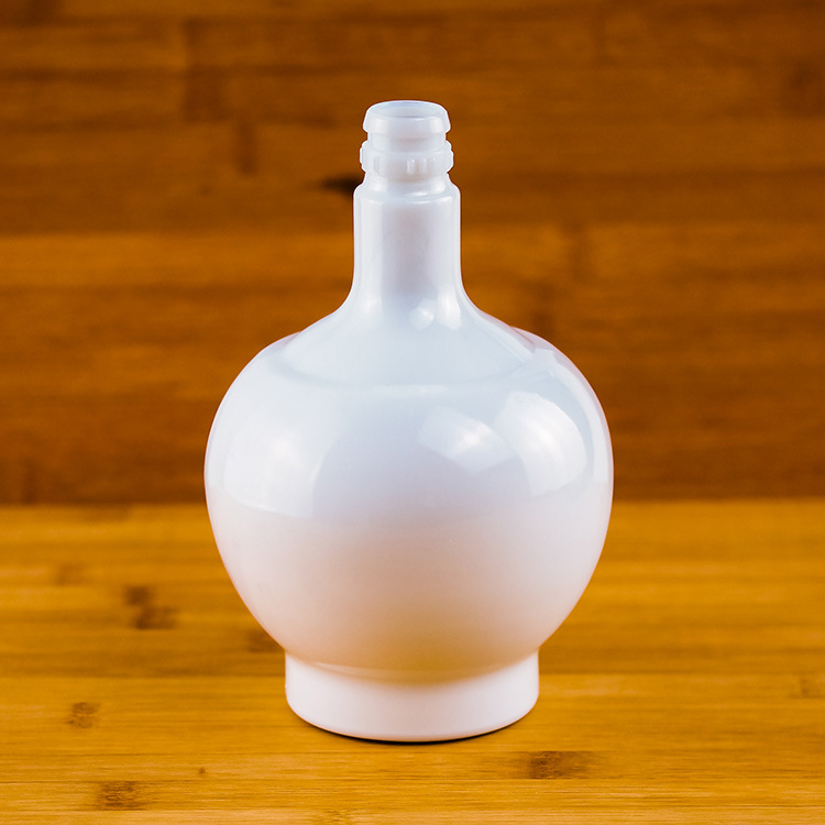 厂家生产500ml牙口球形白色陶瓷四特玻璃空瓶子 高档一斤装白酒瓶
