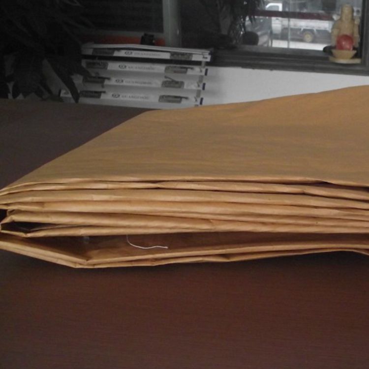 复合牛皮纸包装床垫运输耐磨防尘防潮隔水编织牛皮纸卷料直销