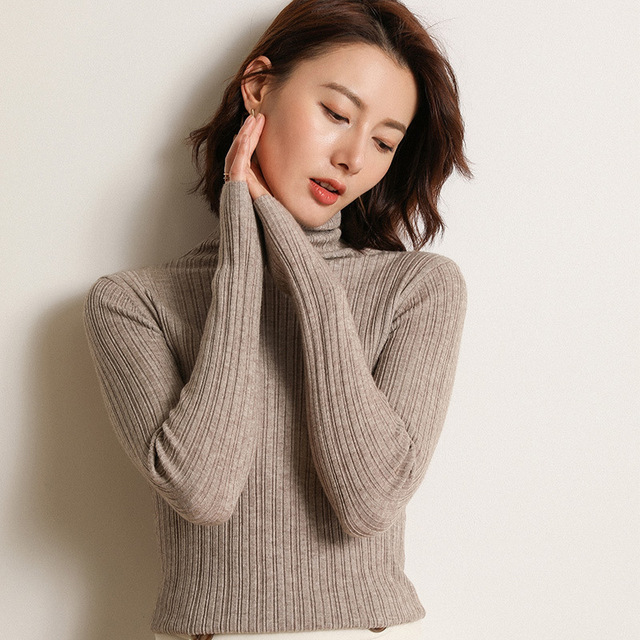 Autumn and winter new knitted sweater women’s 100 solid color pile neck Pullover Sweater slim bottom cashmere sweater wo