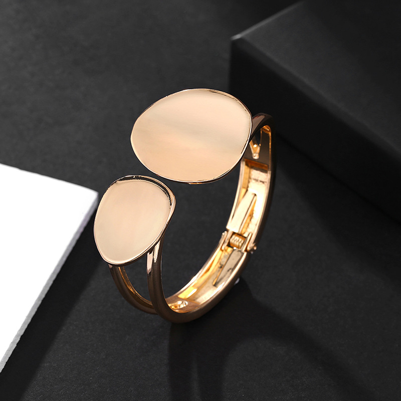 Hollow Asymmetrical Oval Alloy Open Bracelet