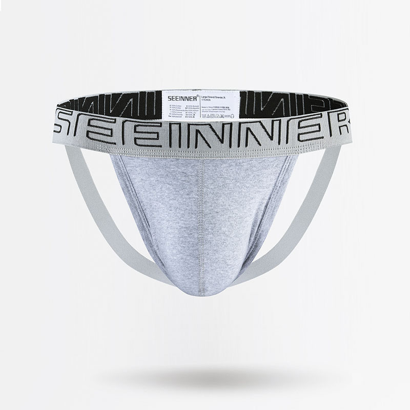 Ropa interior sexy de algodón para hombre, tanga de cintura baja de color liso, doble, para comercio exterior.