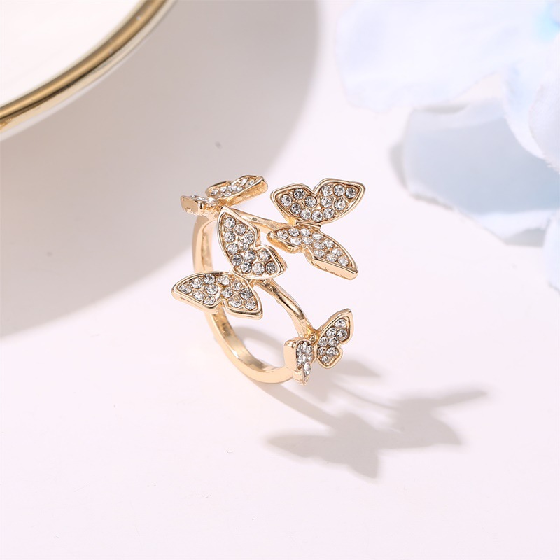 New Opening Ring Hand Ornament Full Diamond Four Butterfly Ring Finger Opening Ring Wholesale Nihaojewelry display picture 6