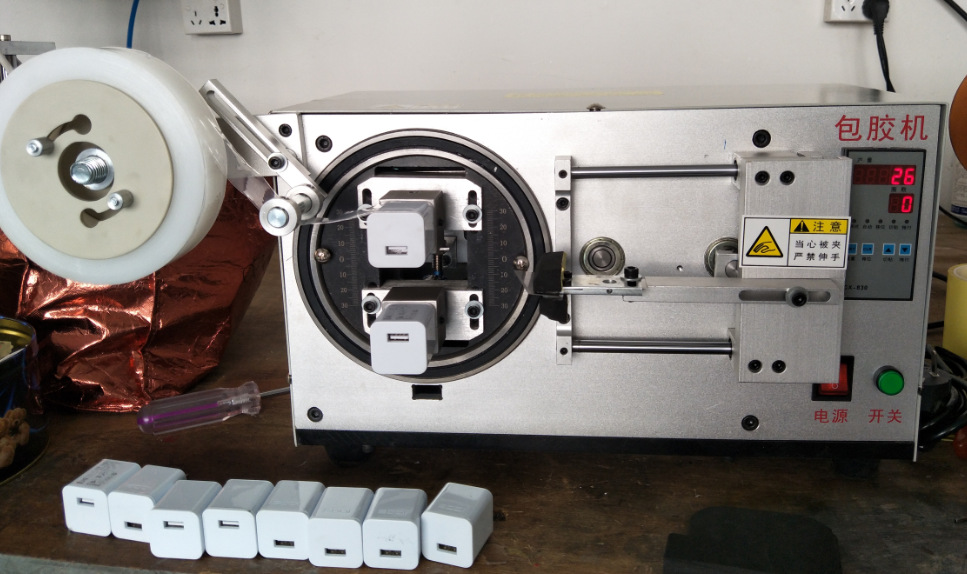 充电器保护膜包膜机变压器磁芯线圈包胶带机充电器保护膜包膜机