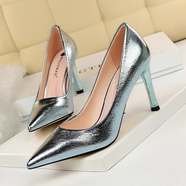 European and American fashion sexy high heels show thin stone pattern shallow mouth point