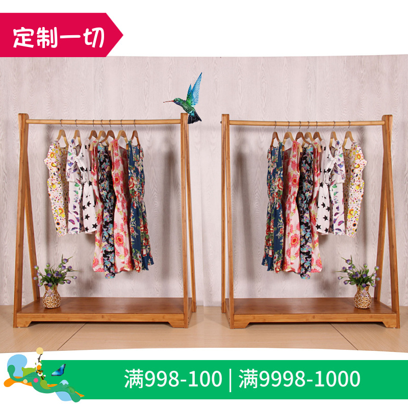 爱衣整店装修设计定制效果图 服装店竹子木质龙骨波浪展示货架