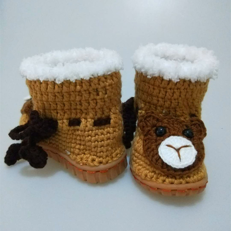 Autumn and winter men and women baby Plush thickening baby baby manual weave Wool boots