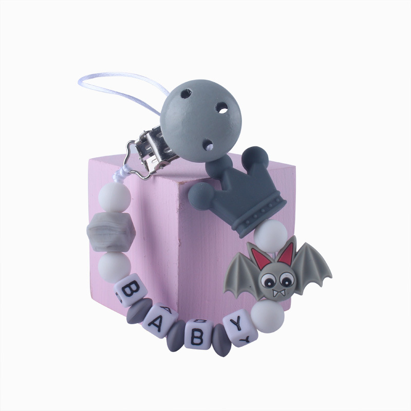 Patrón de dibujos animados de bebé de silicona chupete Cadena de dientes de bebé Cadena de molienda chupete cadena anti-caída comercio exterior