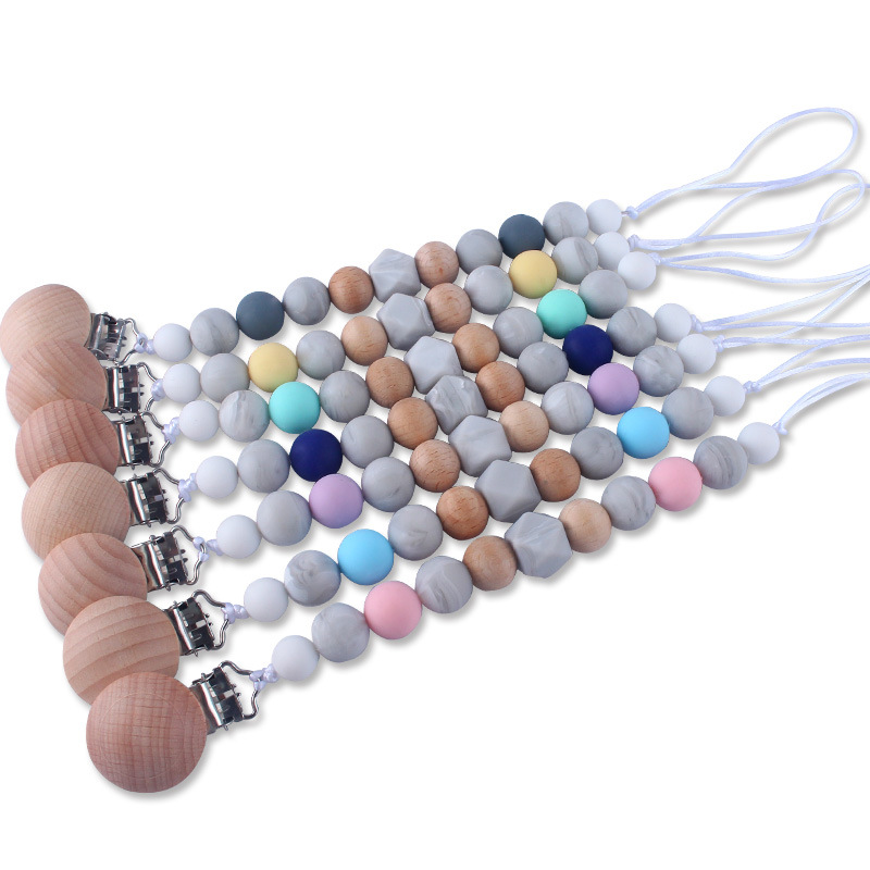 Bebé chupete anti-gota cadena bebé juguete de silicona chupete clip anti-gota banda Chew música anti-perdido cadena Nuevo