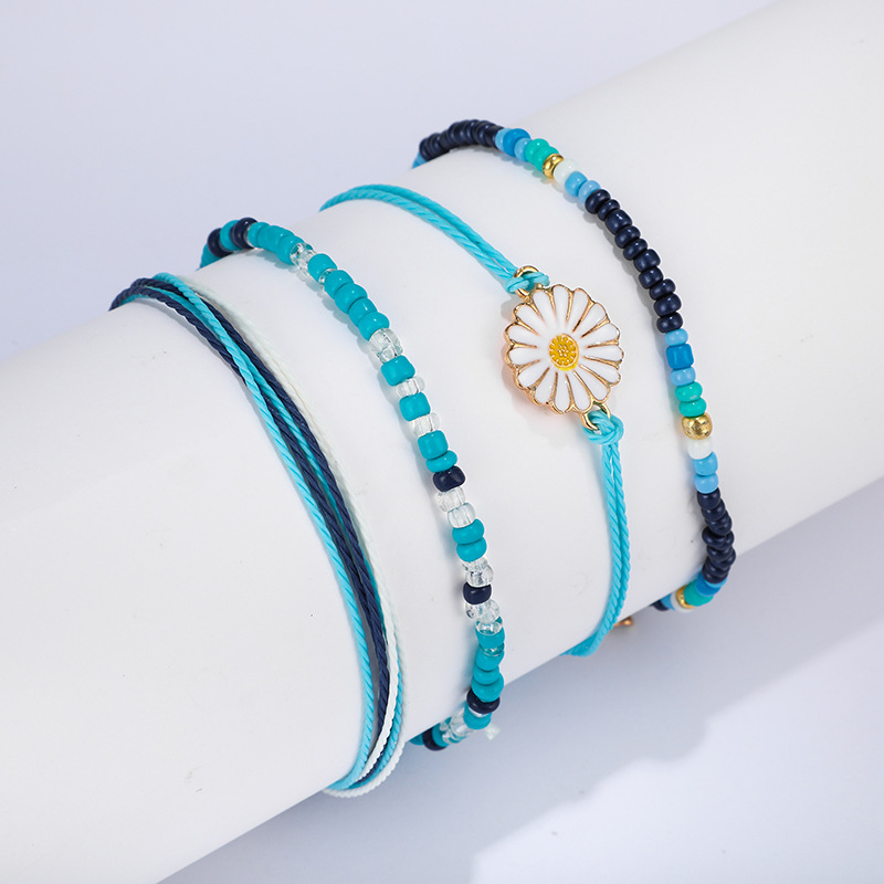 Europäische Und Amerikanische Grenz Überschreitende Neue Hand Gewebte Schnur Farbe Reis Perlen Blumen Armband Gänseblümchen Schnur Armband 4-teiliges Set display picture 8