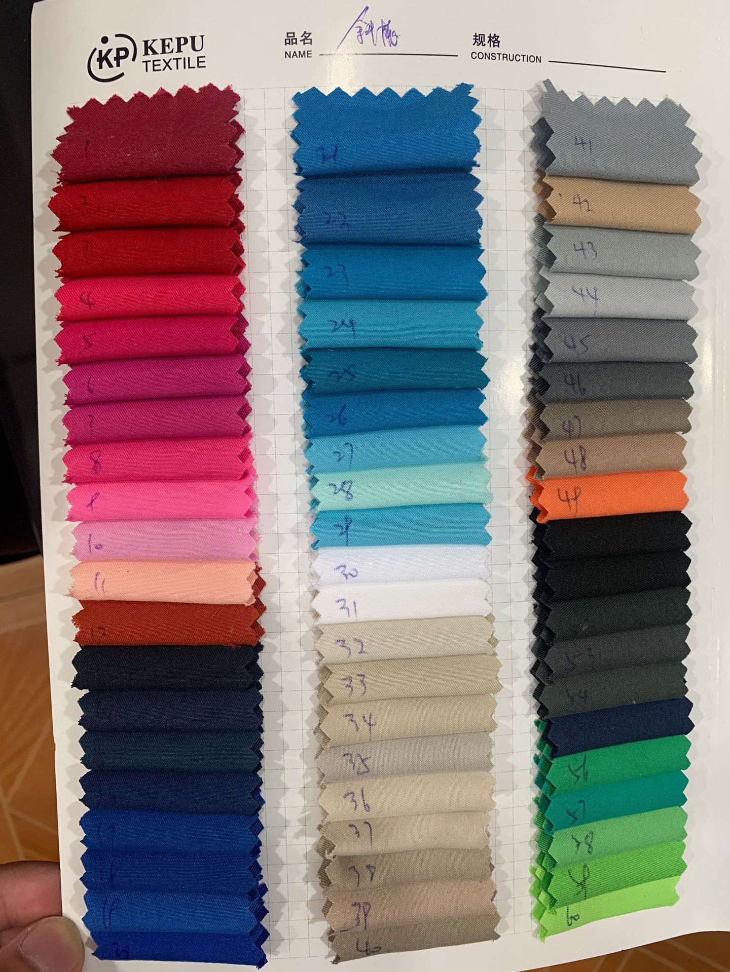 布料批发涤纶布料斜纹桃皮绒布料磨毛布手袋里布家居家纺用布