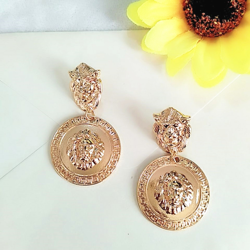 Simple Embossed Lion Head Metal Earrings display picture 2