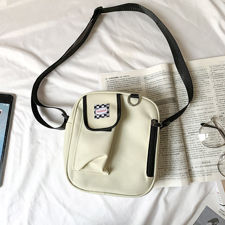 Bolsa pequeña de lona para mujer 2019 Nueva bolsa de mensajero de moda estilo coreano estudiante ins Internet celebridad pequeña bolsa negra entrega de una pieza