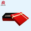 Red gift box with bow, scarf