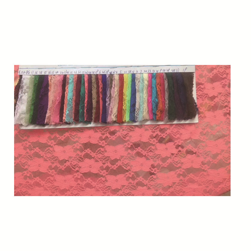 锦氨网布弹力小梅花蕾丝面料 女装上衣连衣裙蕾丝面料厂家批发 举