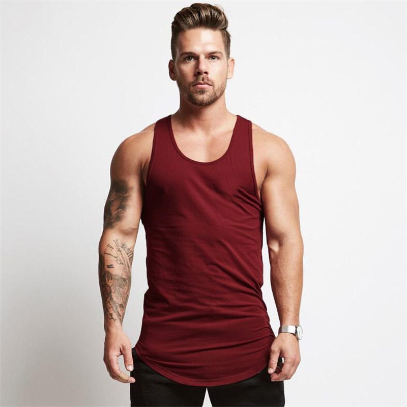 Comercio exterior Tablero ligero hombres de excavación profunda culturismo Chaleco de fitness de verano de los hombres color sólido entrenamiento integral Camiseta deportiva de fondo Algodón