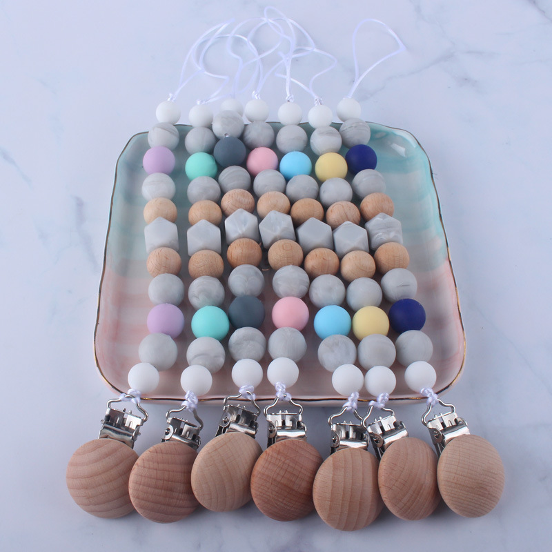 Bebé chupete anti-gota cadena bebé juguete de silicona chupete clip anti-gota banda Chew música anti-perdido cadena Nuevo