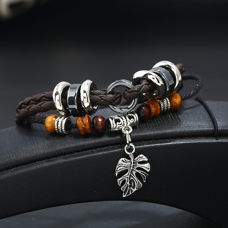 Fashionable leather multi-layer woven leaf pendant menu0027s bracelet explosion models wholesale