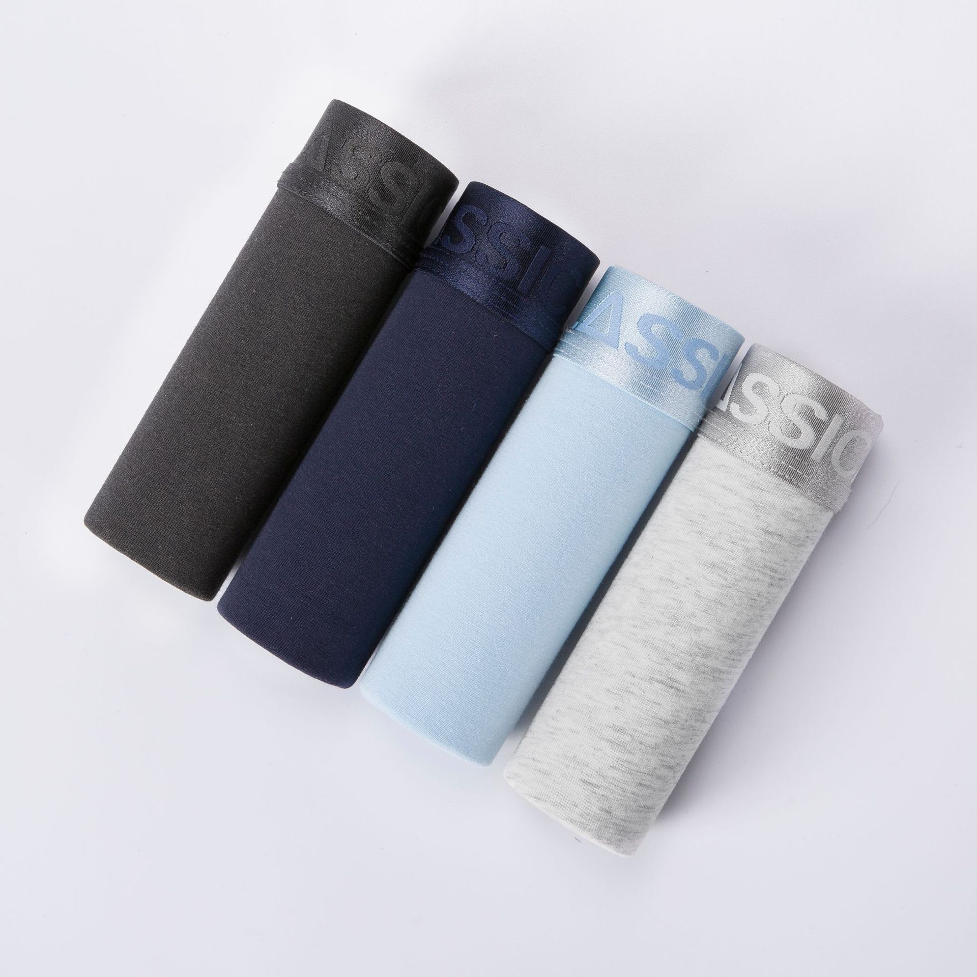 Fabricantes de ropa interior para hombres populares de color sólido ropa interior de algodón boxers en caja pantalones cortos calzoncillos de cabeza boxeadores al por mayor transfronterizos