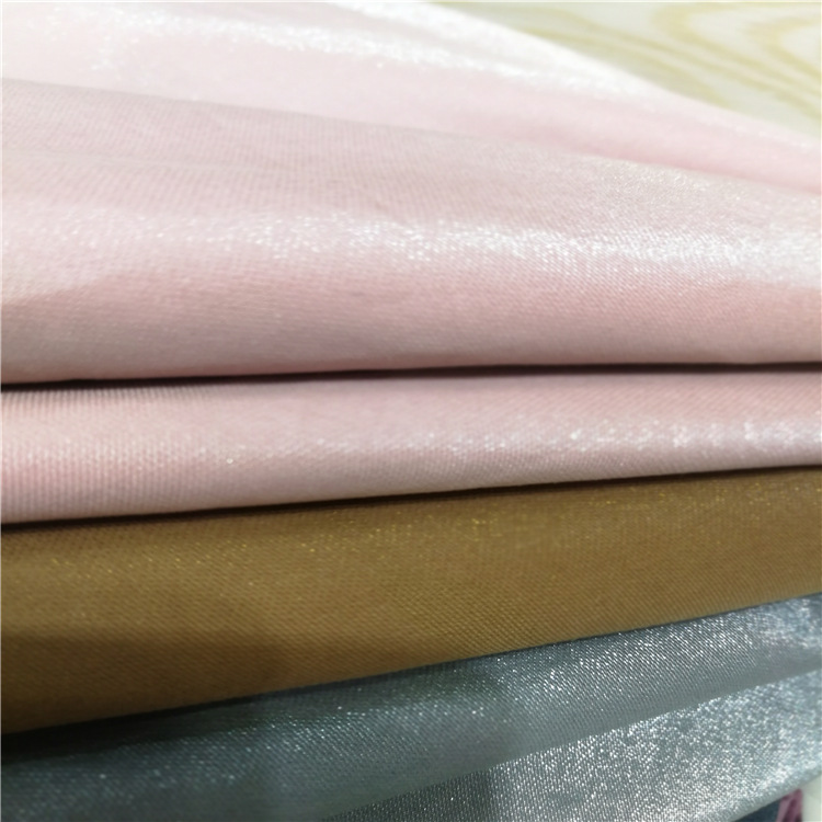现货闪光棉服面料 涤棉锦棉亮丝 春秋棒球服风衣夹克外套面料批发