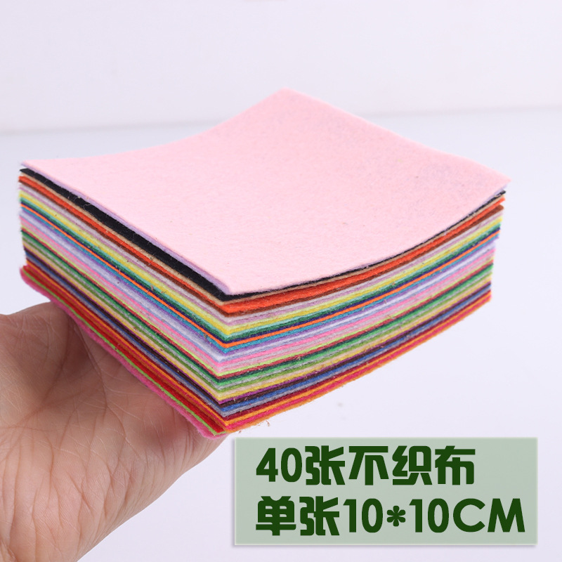 40-color no tejido traje de tela libre costura material no tejido hecho a mano material de bricolaje Paquete de Corte libre de color de producción