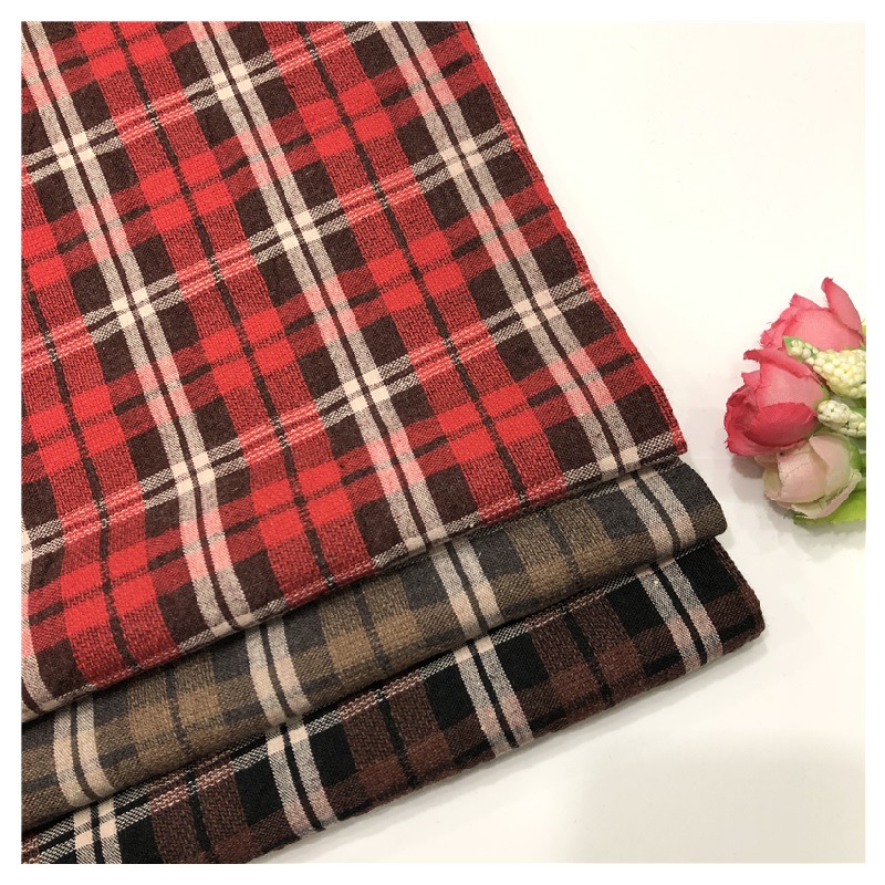 厂家供应 色织格子布  棉洗水提花格子 春款童装衬衫面料 Y627