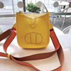 2020 new pattern genuine leather Female bag Litchi Top layer leather Evelyn One shoulder Inclined shoulder bag ins Hollow Bucket Bag