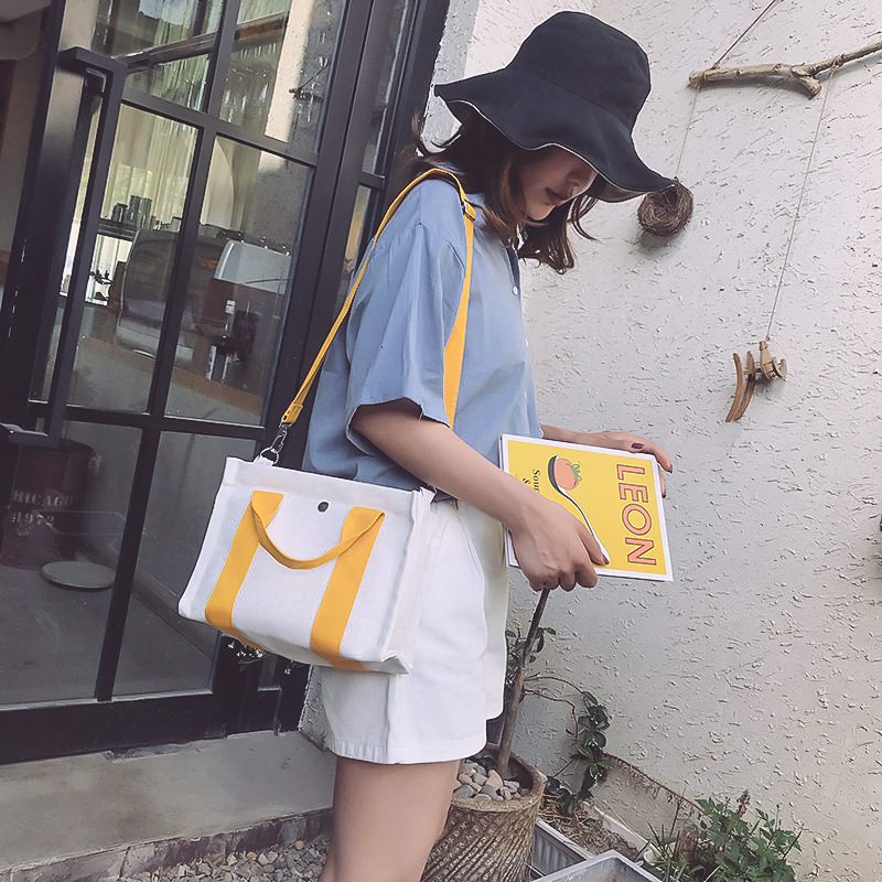 织带小方包模特