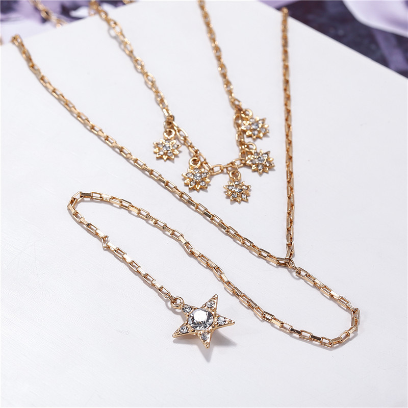 Außenhandels Quelle Schmuck Mode Einfache Diamant Mehrere Fünfzackige Stern Anhänger Doppels Chicht Halskette Pullover Kette Halskette Frauen display picture 9