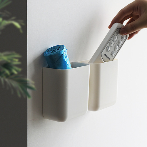 Creative remote control storage box wall hanging household garbage bag storage rack plastic storage box household products
