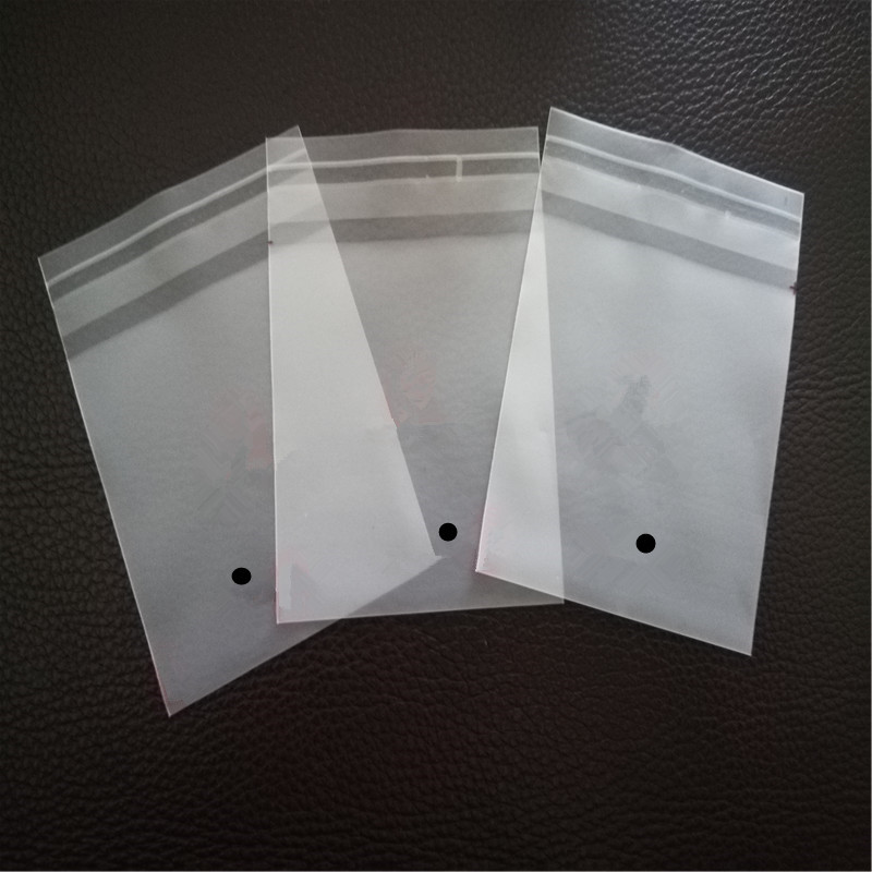 双层12丝可降解自粘袋下方每一面各2个出气孔双面一共4个出气孔