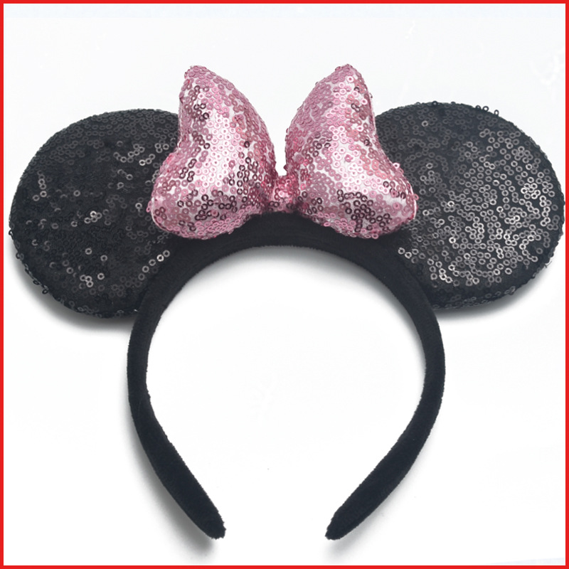 黑色亮片配粉色蝴蝶结