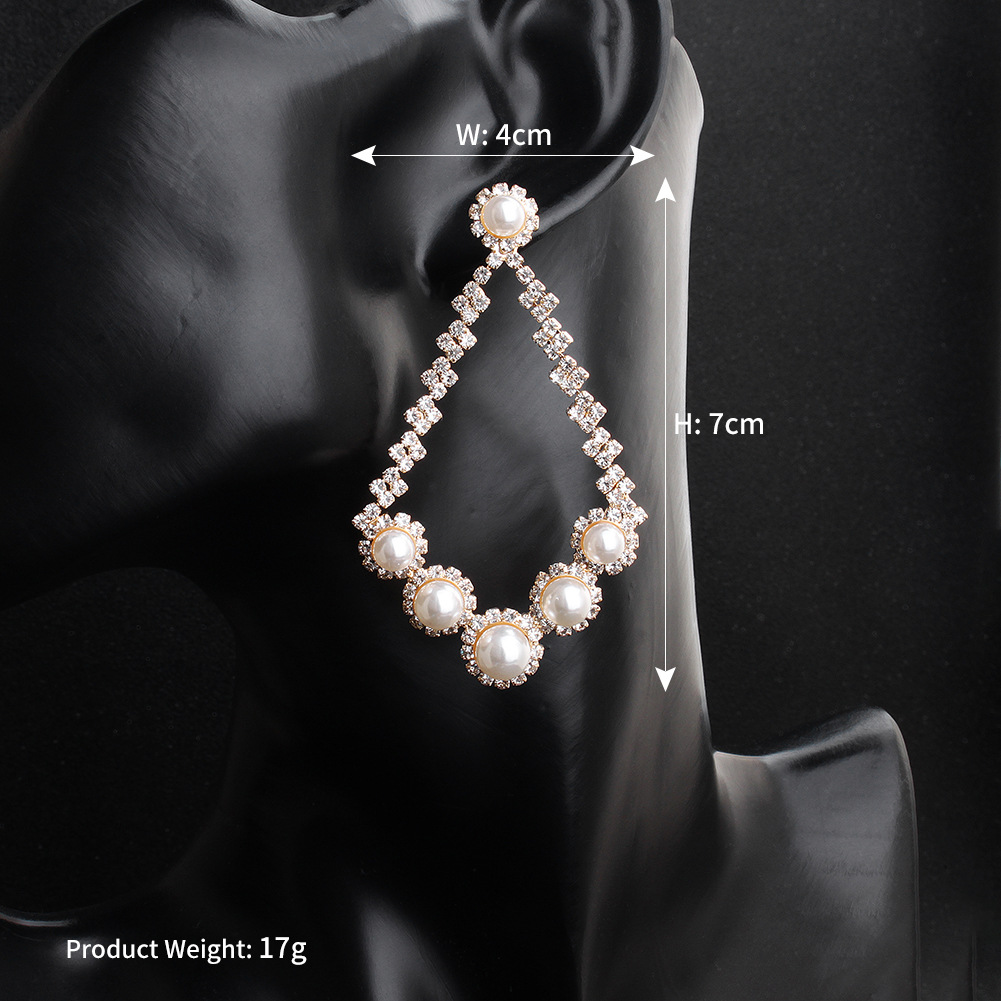 Fashion New Exaggerated Big-brand Trend Banquet Sexy Pearl Diamond Earrings display picture 6