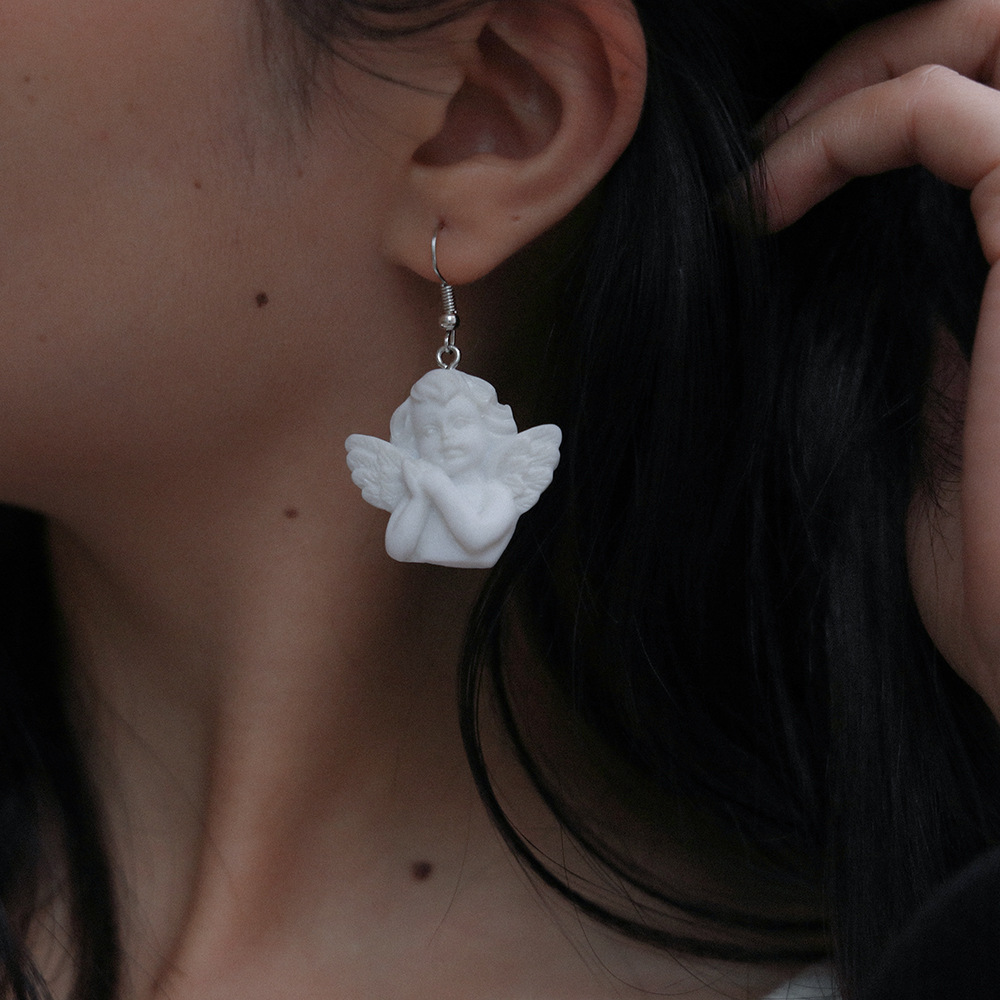 boucles d'oreille ange blanches