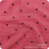 Pink background black spots