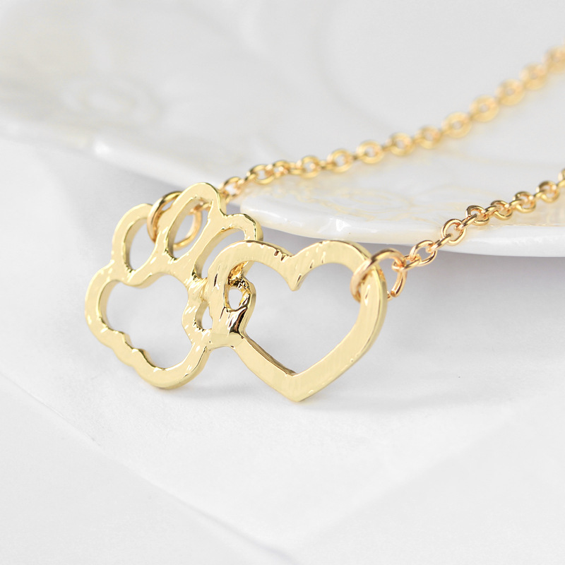 New fashion heart-shaped dog paw stitching pendant necklace wholesale