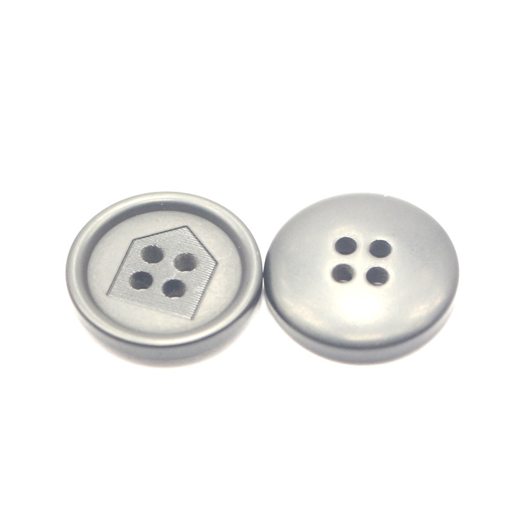 The manufacturer supplies high-grade resin four hole button, high-quality plastic button, high-grade durable four eye button, quantity and price