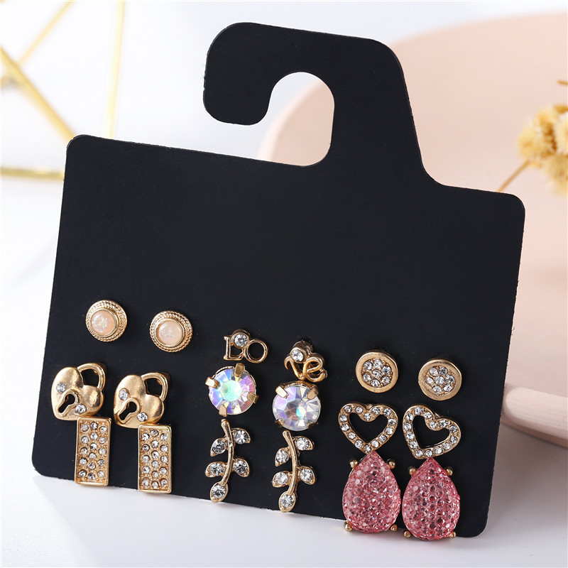 Korean Temperament Fresh Pink Gypsophila Diamonds Love Leaves Lock Geometric Earrings  Wholesale Nihaojewelry display picture 4